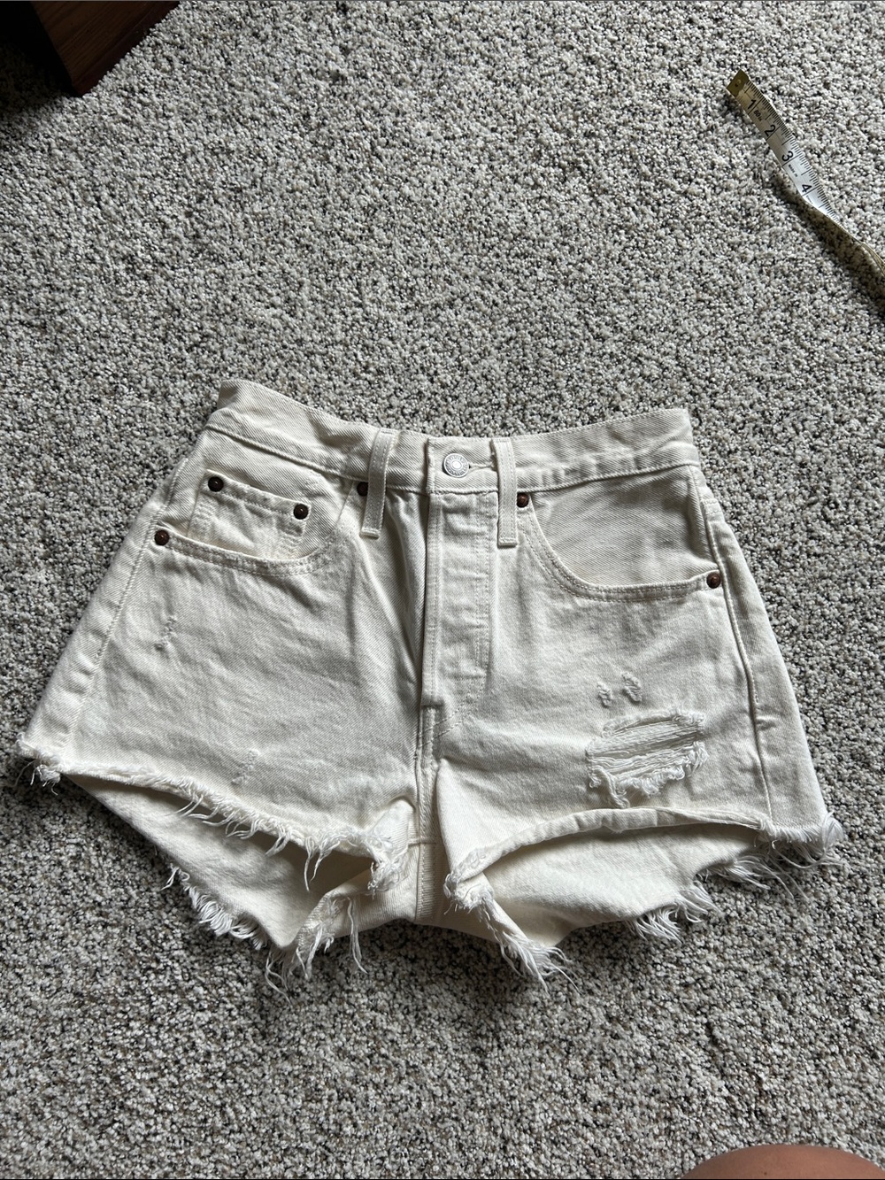Levi’s High Rise Cream Cutoff Denim Shorts | Size 24